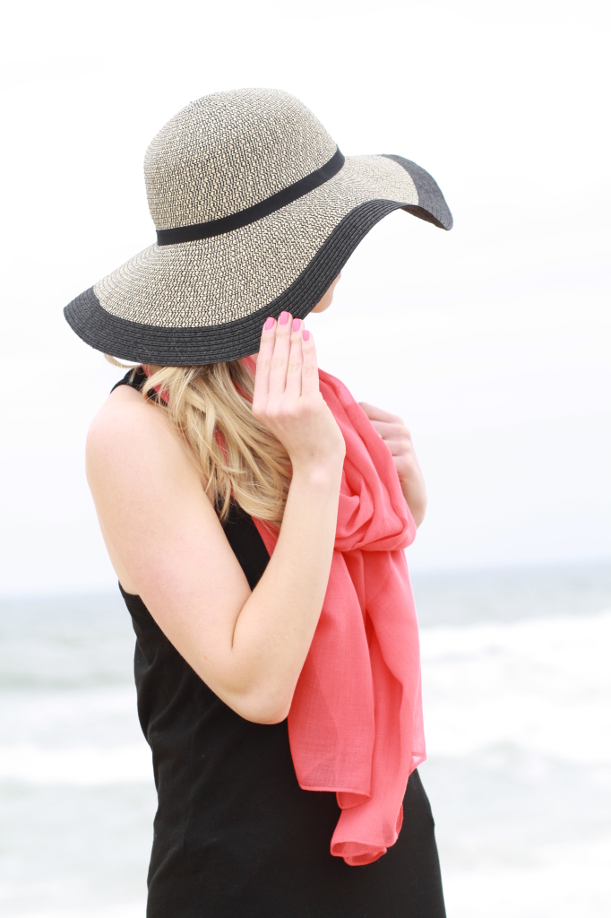 floppy straw hat, coral scarf 