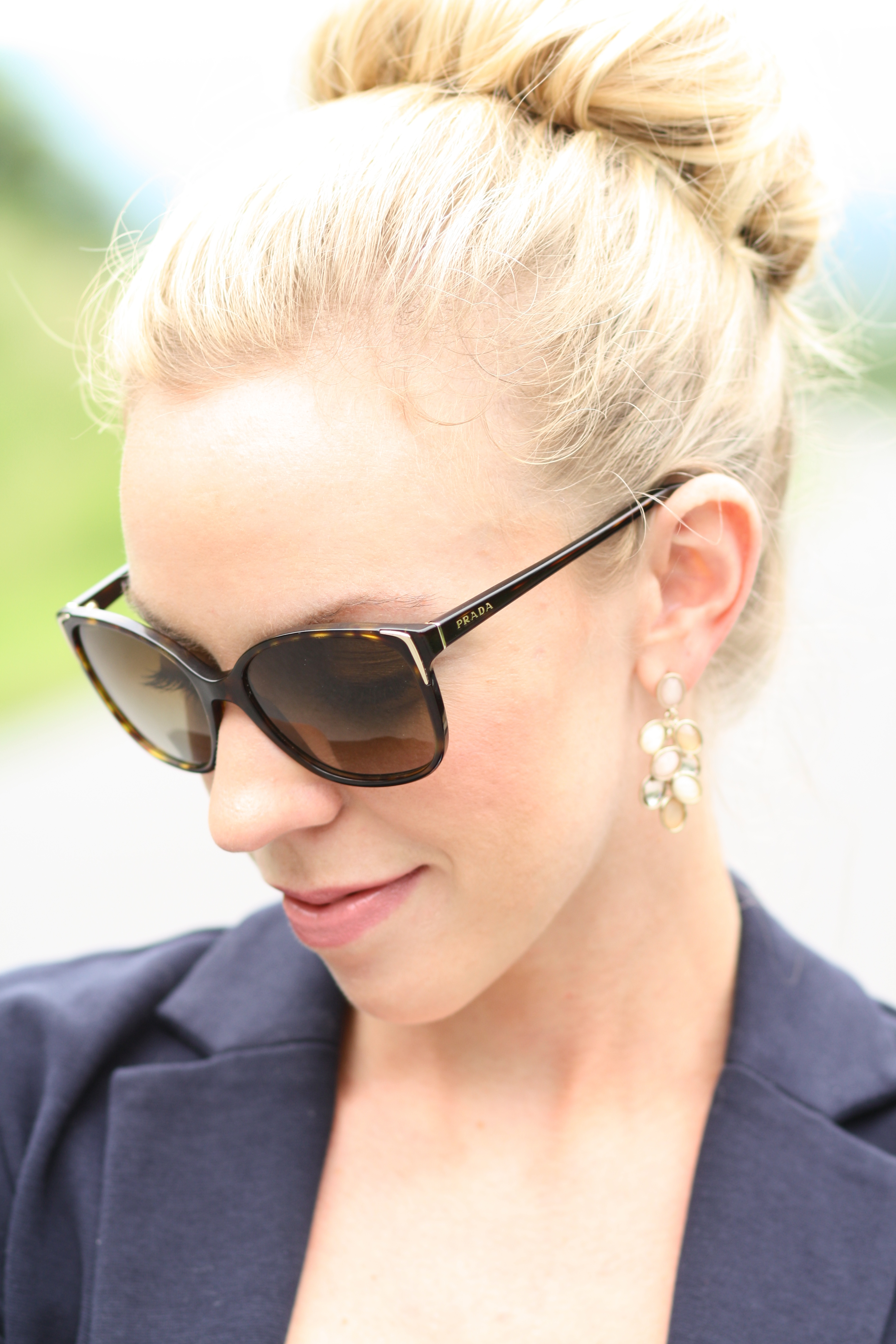 tortoiseshell Prada sunglasses, faux sock bun, navy knit blazer, gold  beaded earrings, neutral stone jewelry - Meagan's Moda