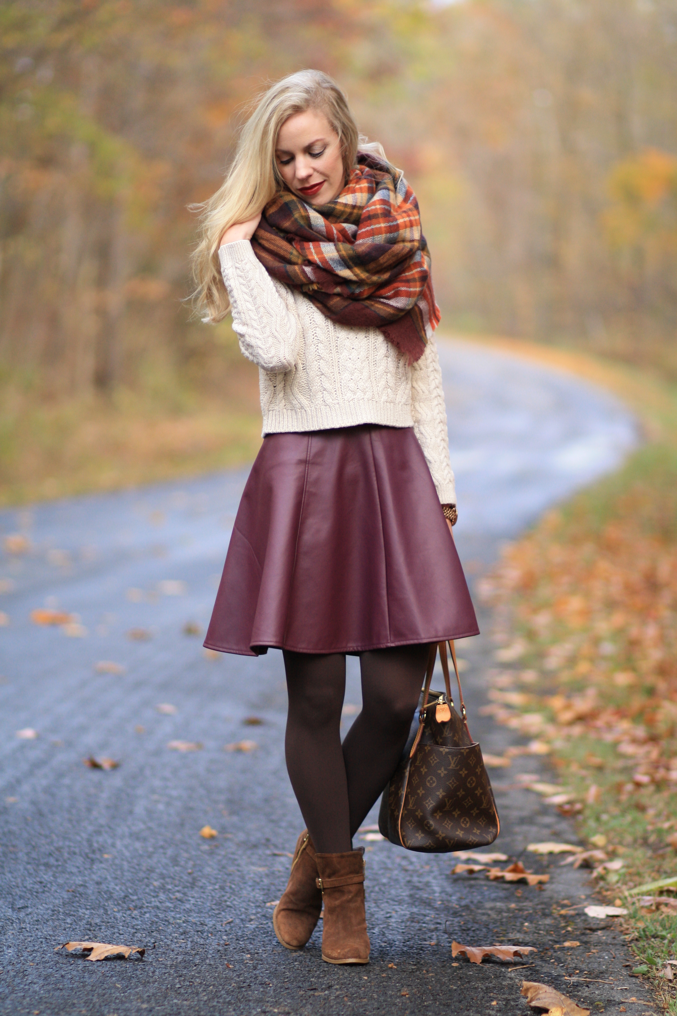 Lauren Conrad for kohls burgundy wine leather circle skirt, leather skater  skirt, burgundy red leather skirt, cropped cable sweater, ZARA plaid  blanket scarf, brown suede ankle boots, Louis Vuitton totally MM tote 