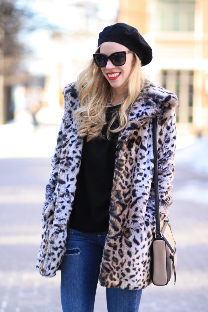 black cashmere beret hat, Piperlime leopard faux fur coat, black oversized  sweater, Paige 'Carmen tear and repair' verdugo skinny jeans, Kate Spade  colorblock bag, Clinique 'red red red' lipstick, Chanel cateye sunglasses -