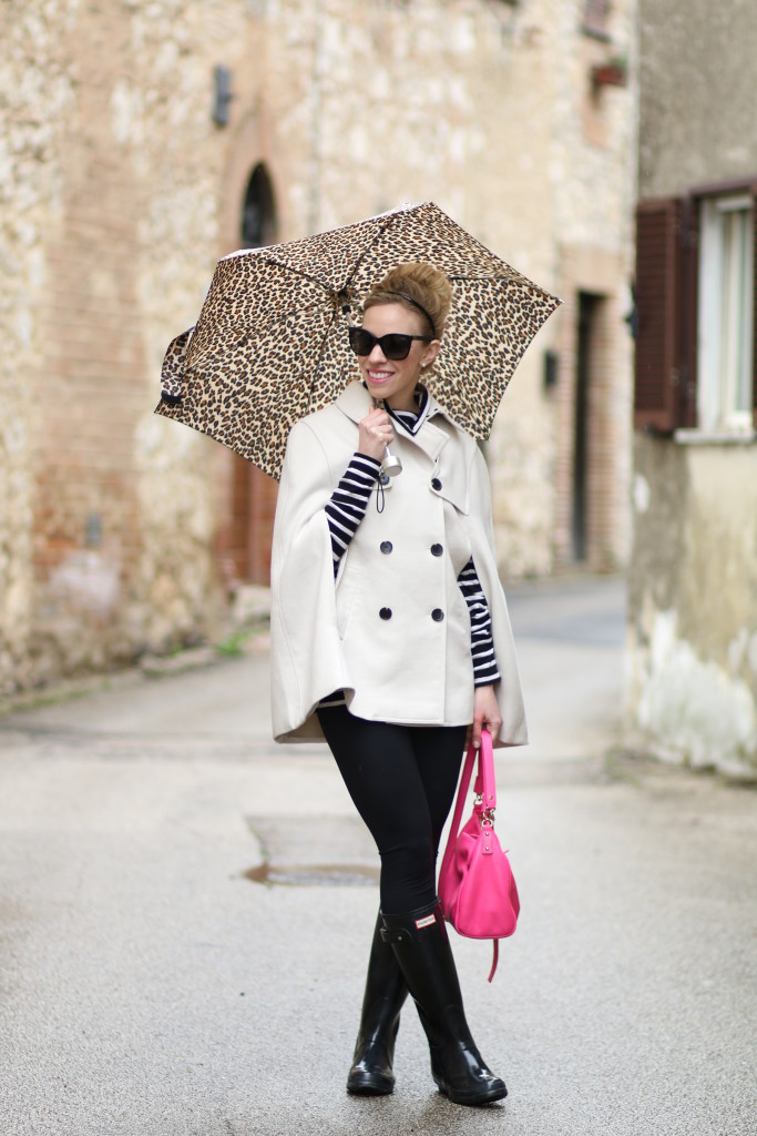 Ann Taylor trench cape, Kate Spade hot pink bag, black and white striped  turtleneck, Zella live-in leggings with black Hunter boots, trench cape  rainy day outfit, black and white with hot pink