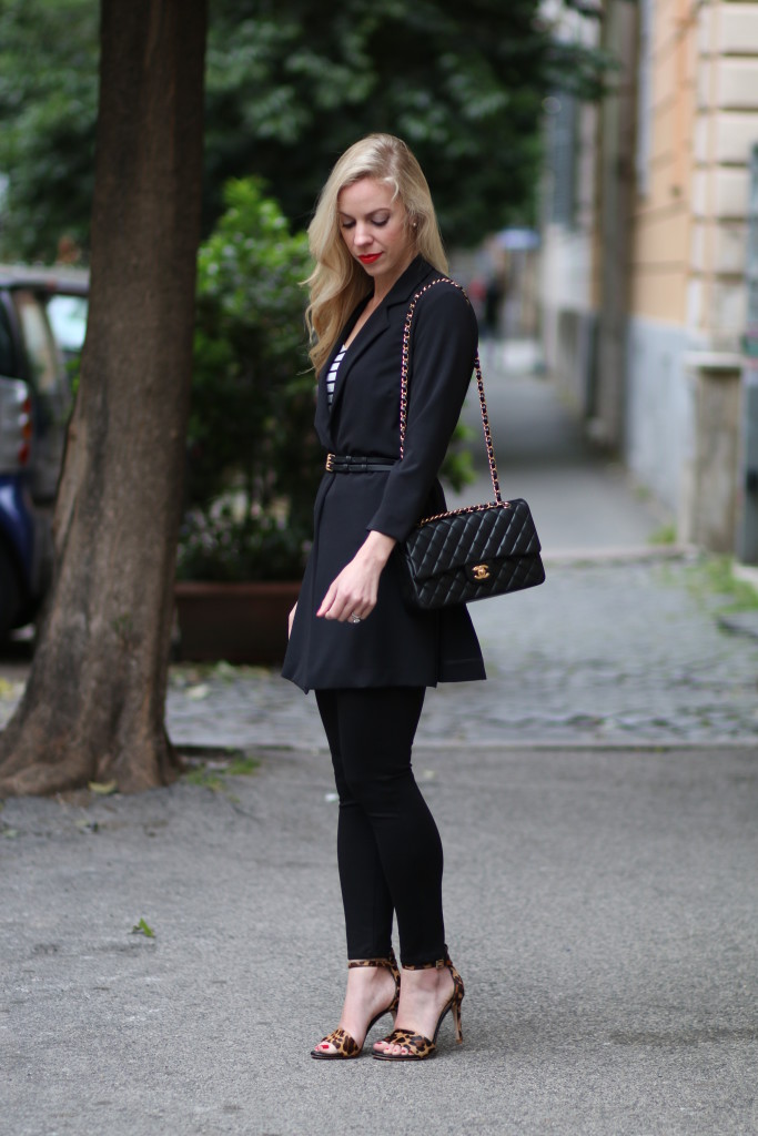 Motivi long black jacket, how to wear all black outfit, Chanel medium classic  flap bag black lambskin, Joie leopard sandals, 7 for all mankind black  ankle skinny, Italian fashion blogger - Meagan's Moda