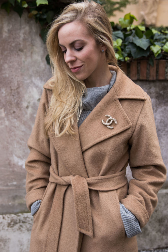 Meagan Brandon fashion blogger shows how to accessorize a winter coat,  different ways to accessorize a coat, Chanel brooch pin camel coat -  Meagan's Moda