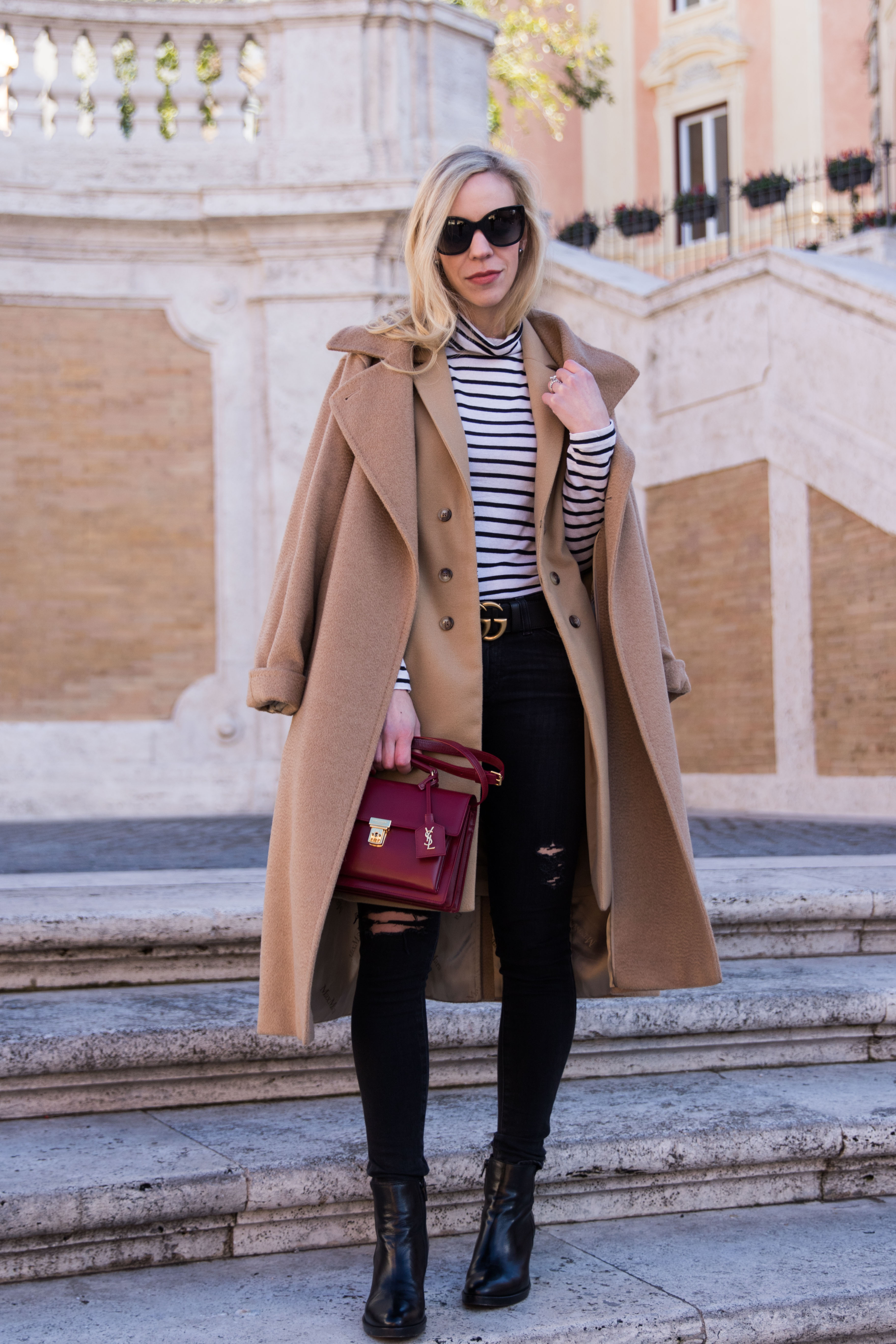 Chic layered fall outfit idea with camel sweater, black denim skirt and  Louis Vuitton brown monogram shine shawl scarf - Meagan's Moda