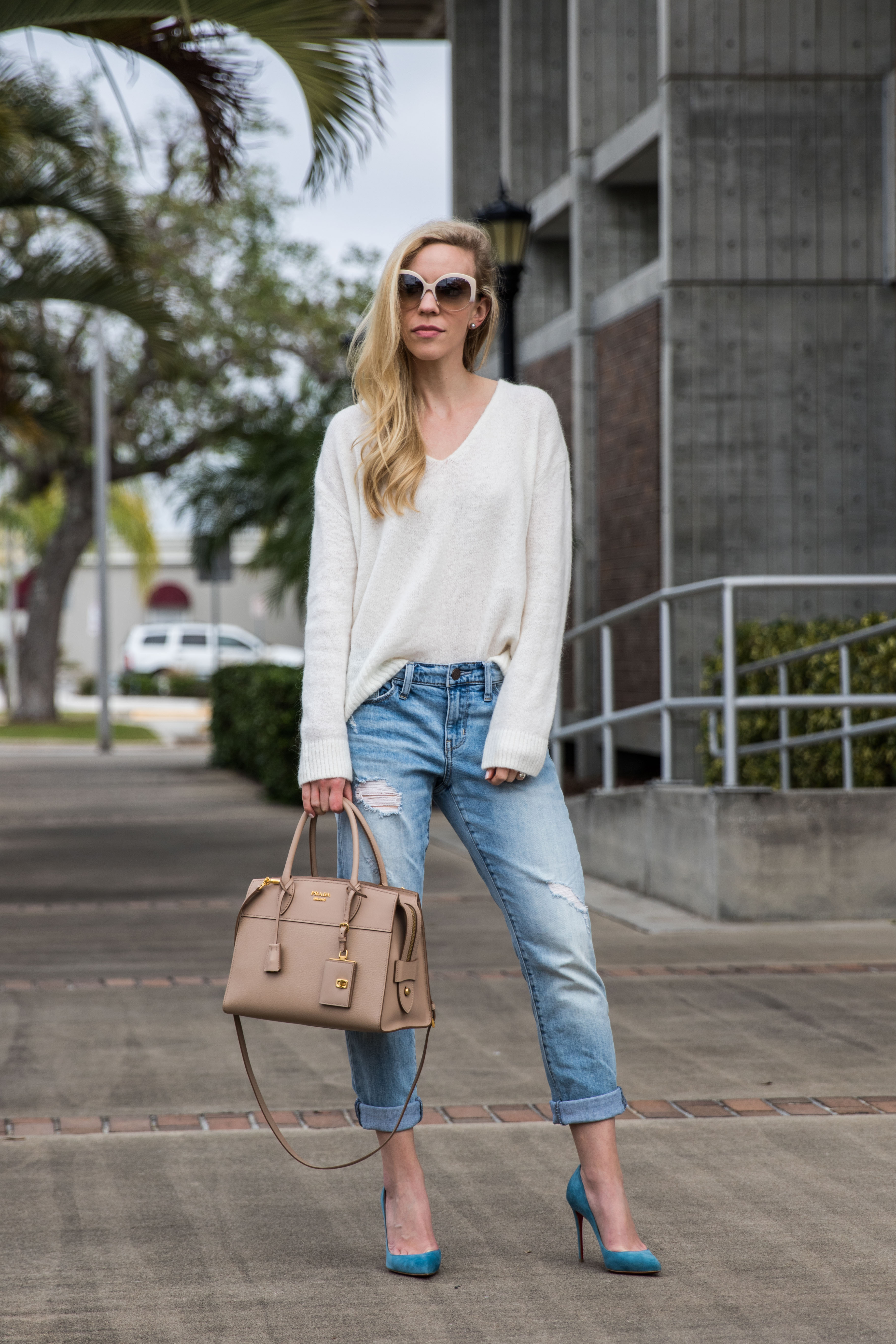 LOFT navy fringe poncho outfit, vintage Louis Vuitton monogram Passy  handbag, navy poncho with white jeans summer outfit - Meagan's Moda