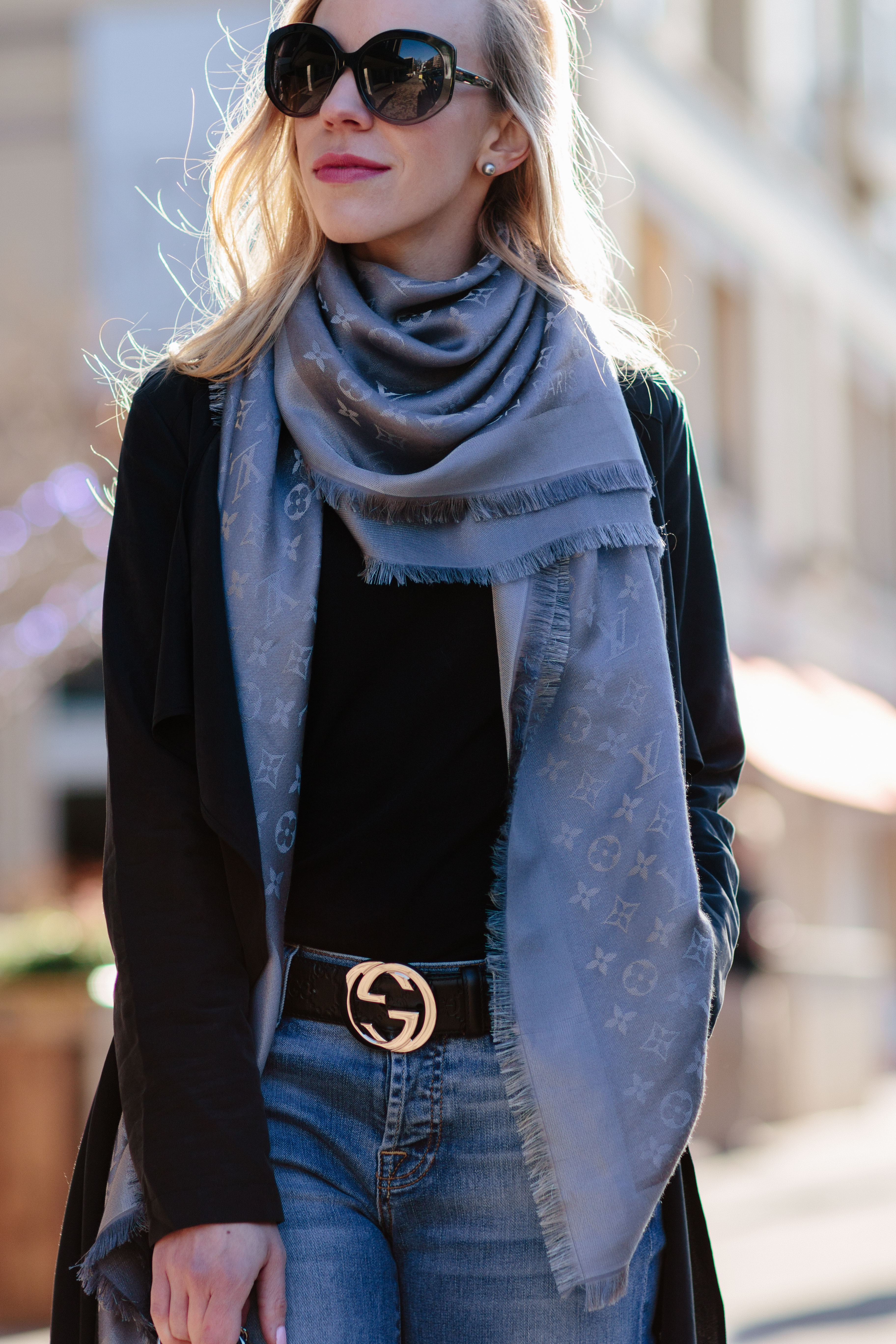 How to style a Louis Vuitton scarf with a leather jacket and gray denim, Louis  Vuitton black shine shawl outfit idea - Meagan's Moda