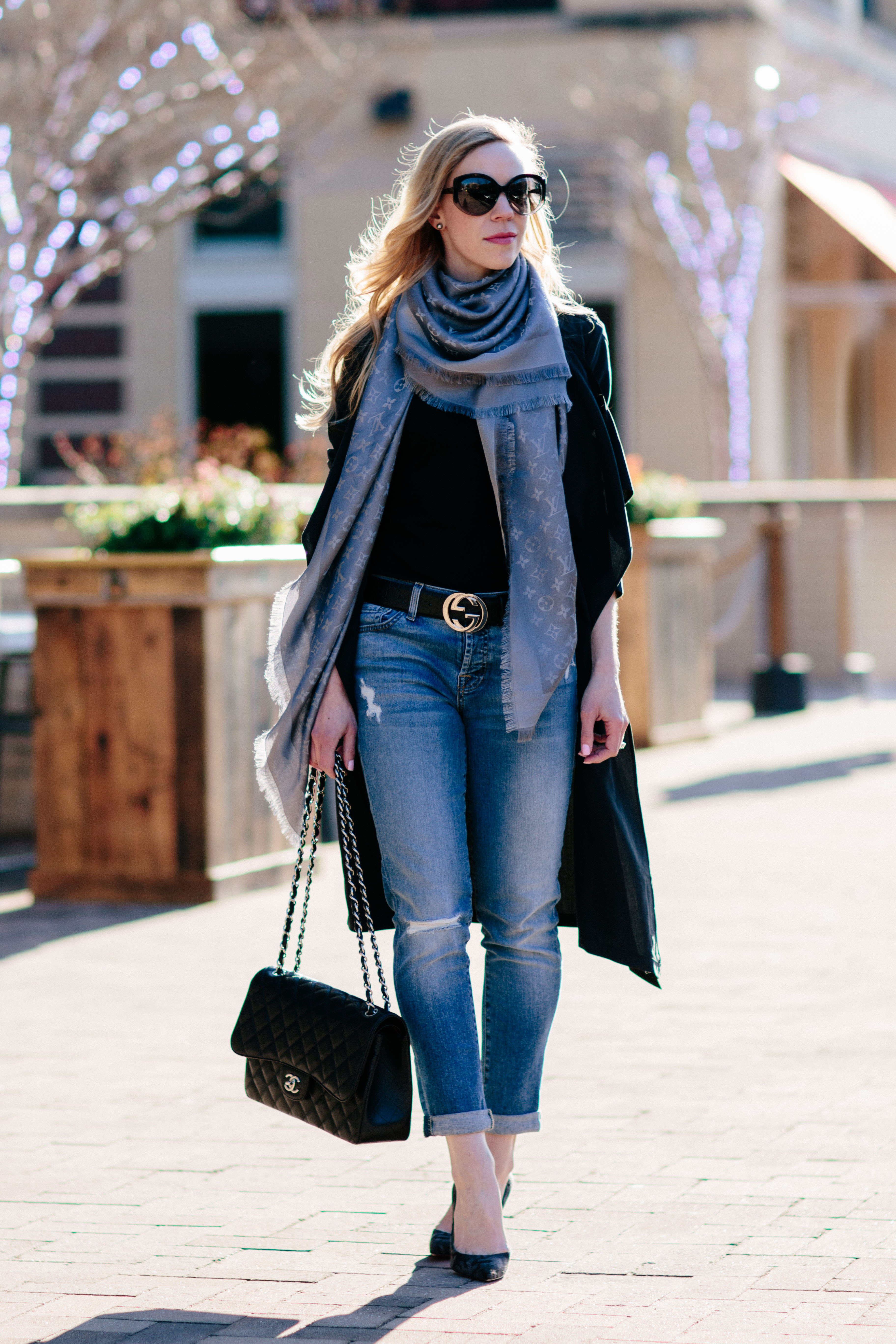 Meagan Brandon fashion blogger of Meagan's Moda wears Louis Vuitton brown shine  shawl monogram scarf with H&M belted plaid blazer and Saint Laurent suede  sac de jour - Meagan's Moda