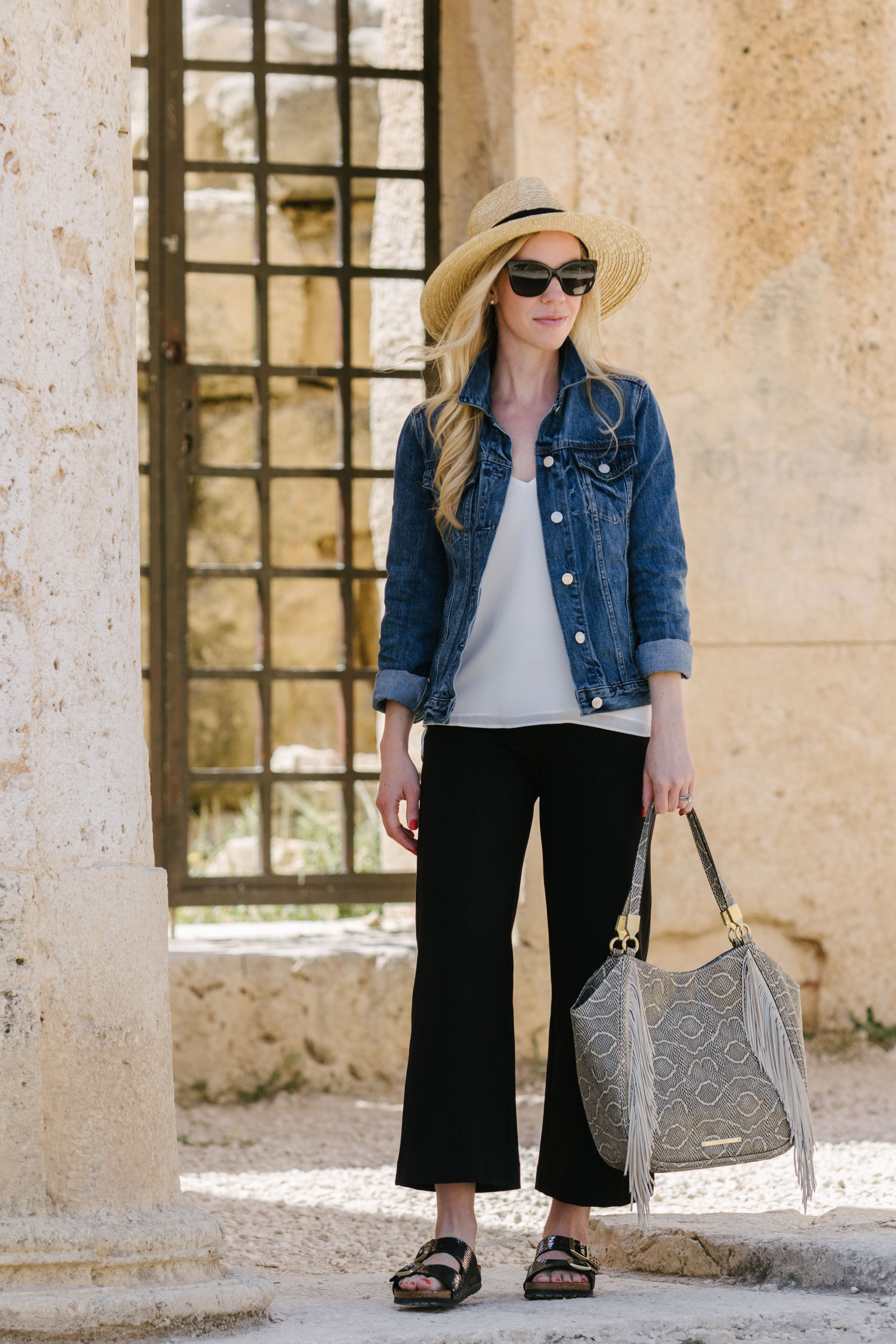 Meagan Brandon fashion blogger wearing denim jacket with white