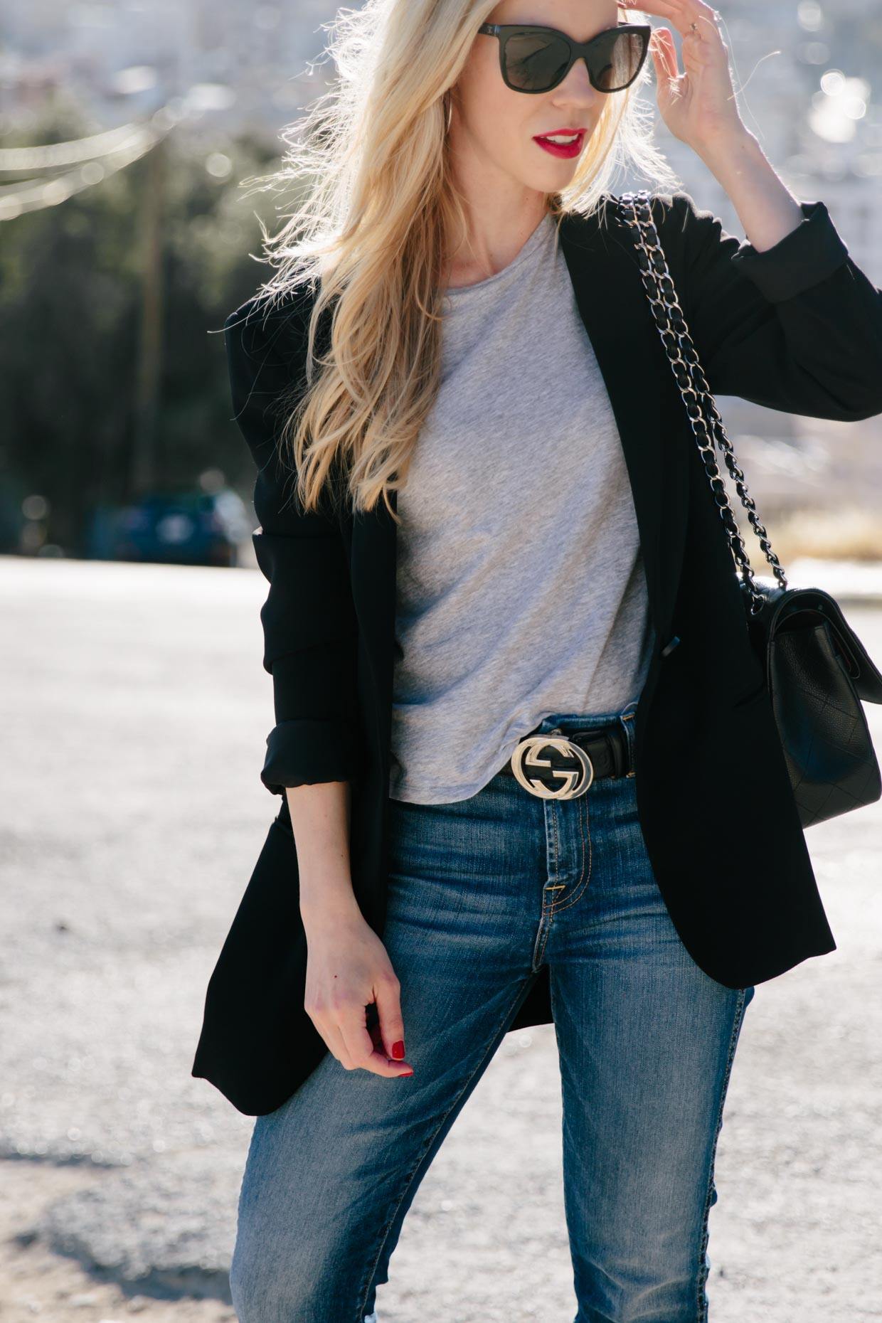 Meagan Brandon fashion blogger wearing long black blazer with gray tee,  black Gucci belt and high waist jeans, Chanel Jumbo bag - Meagan's Moda