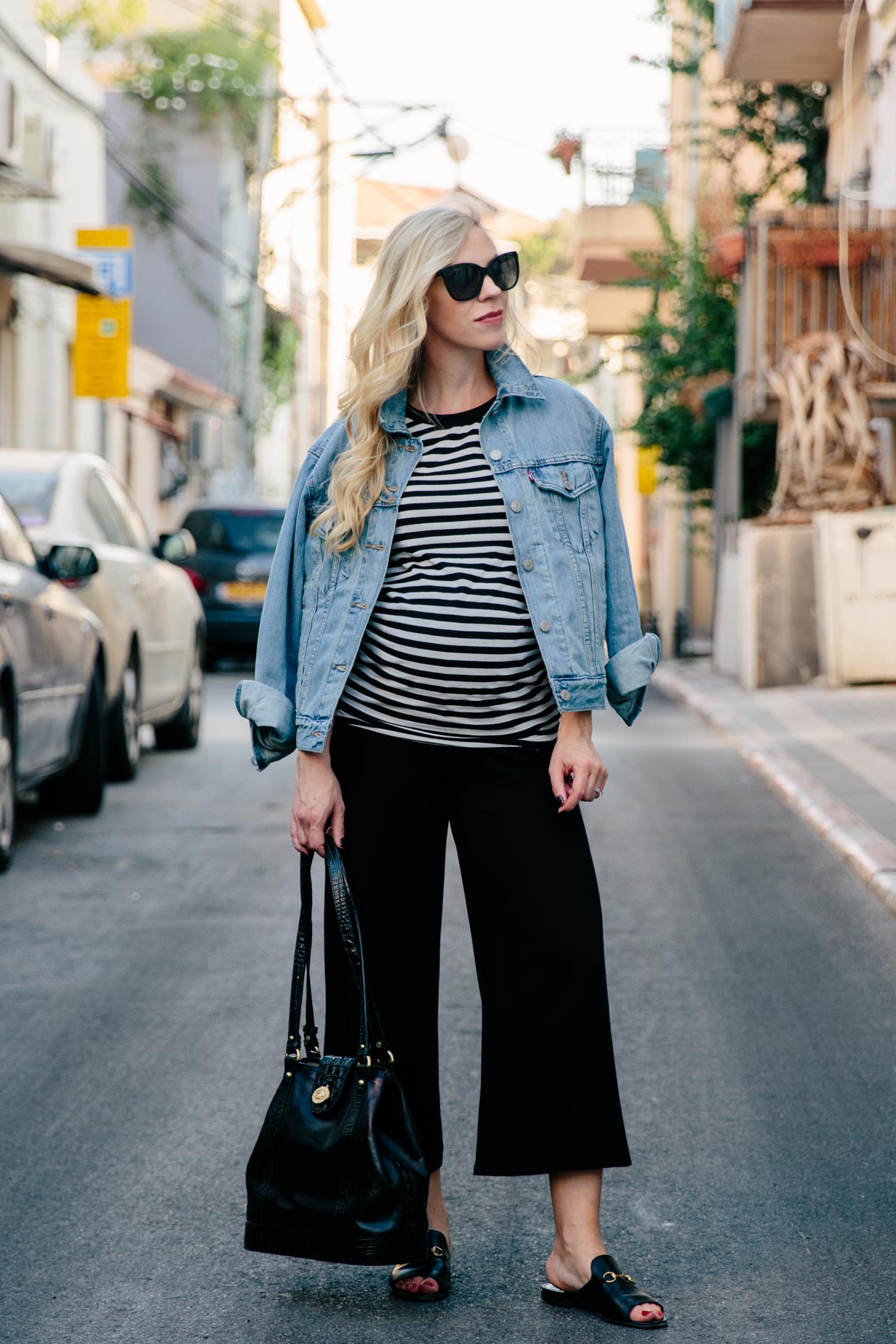 Meagan's Moda fashion blogger wears chic and comfortable maternity outfit with striped tee, denim jacket and cropped wide leg trousers, Gucci slide sandals – Meagan's Moda