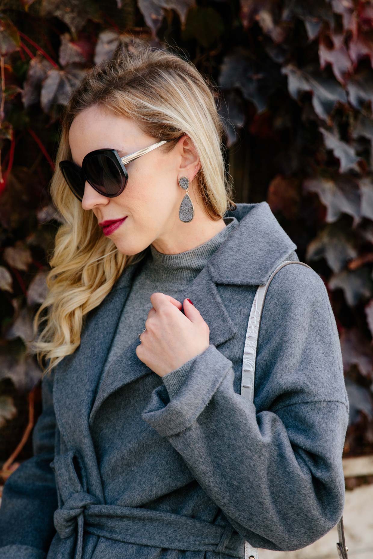 Meagan Brandon fashion blogger of Meagan s Moda styles Bauble Bar Moonlight drop earrings for holiday look with gray wrap coat Meagan s Moda