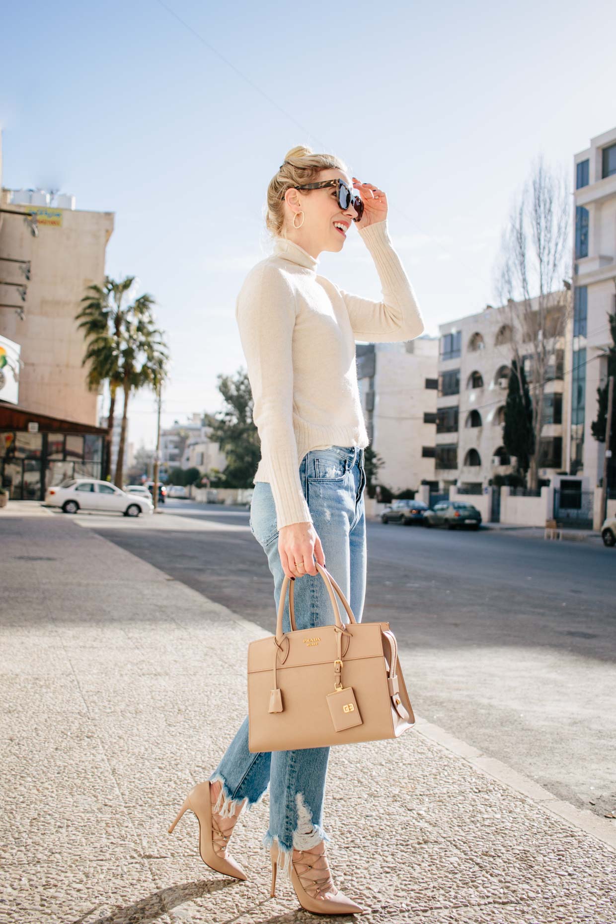 Meagan Brandon fashion blogger of Meagan's Moda wears brown faux leather  pants with Louis Vuitton Dauphine - Meagan's Moda