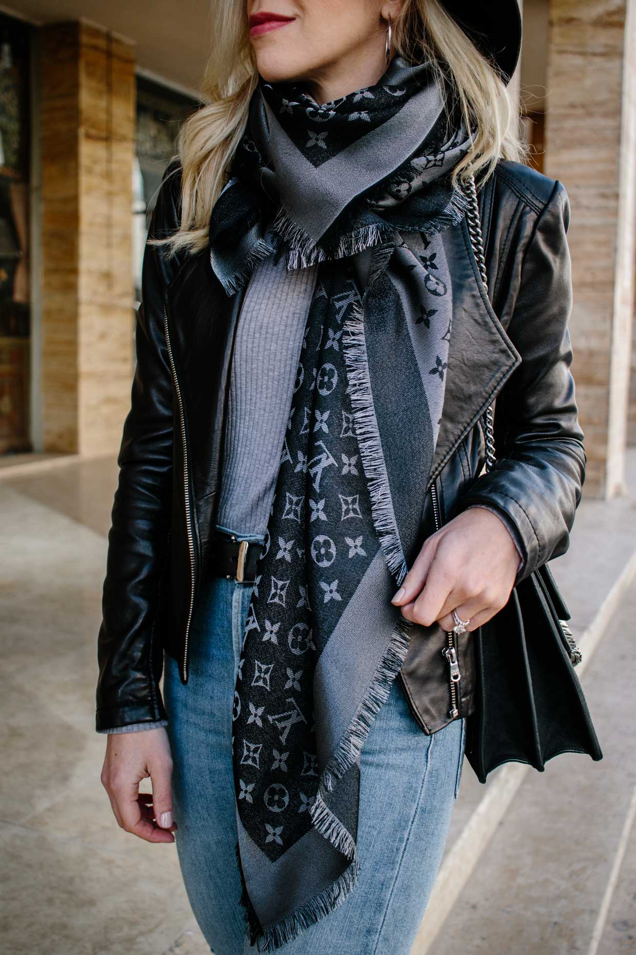 Meagan Brandon fashion blogger of Meagan's Moda shows how to style a Louis  Vuitton black shine shawl with leather jacket and high waist skinny jeans -  Meagan's Moda