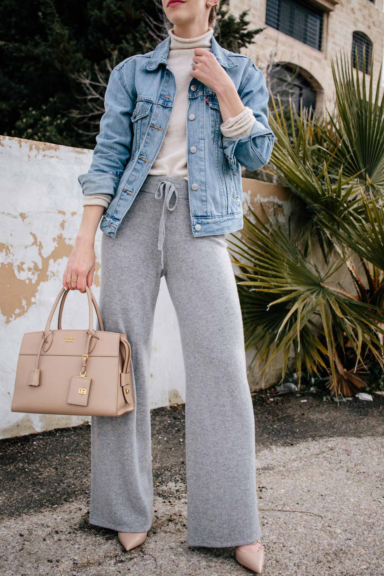 Meagan Brandon fashion blogger of Meagan's Moda wears brown faux leather  pants with Louis Vuitton Dauphine - Meagan's Moda