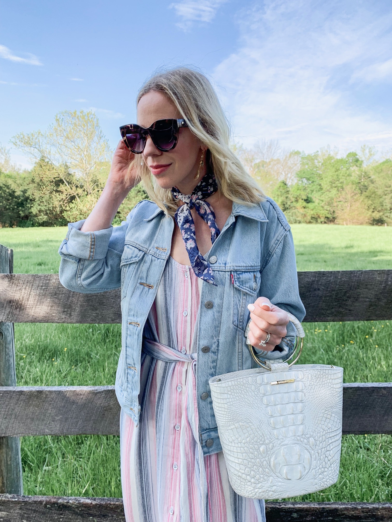 Meagan Brandon style influencer of Meagan's Moda wears cropped denim jacket  with Chanel brooch, ideas for wearing Chanel pin - Meagan's Moda