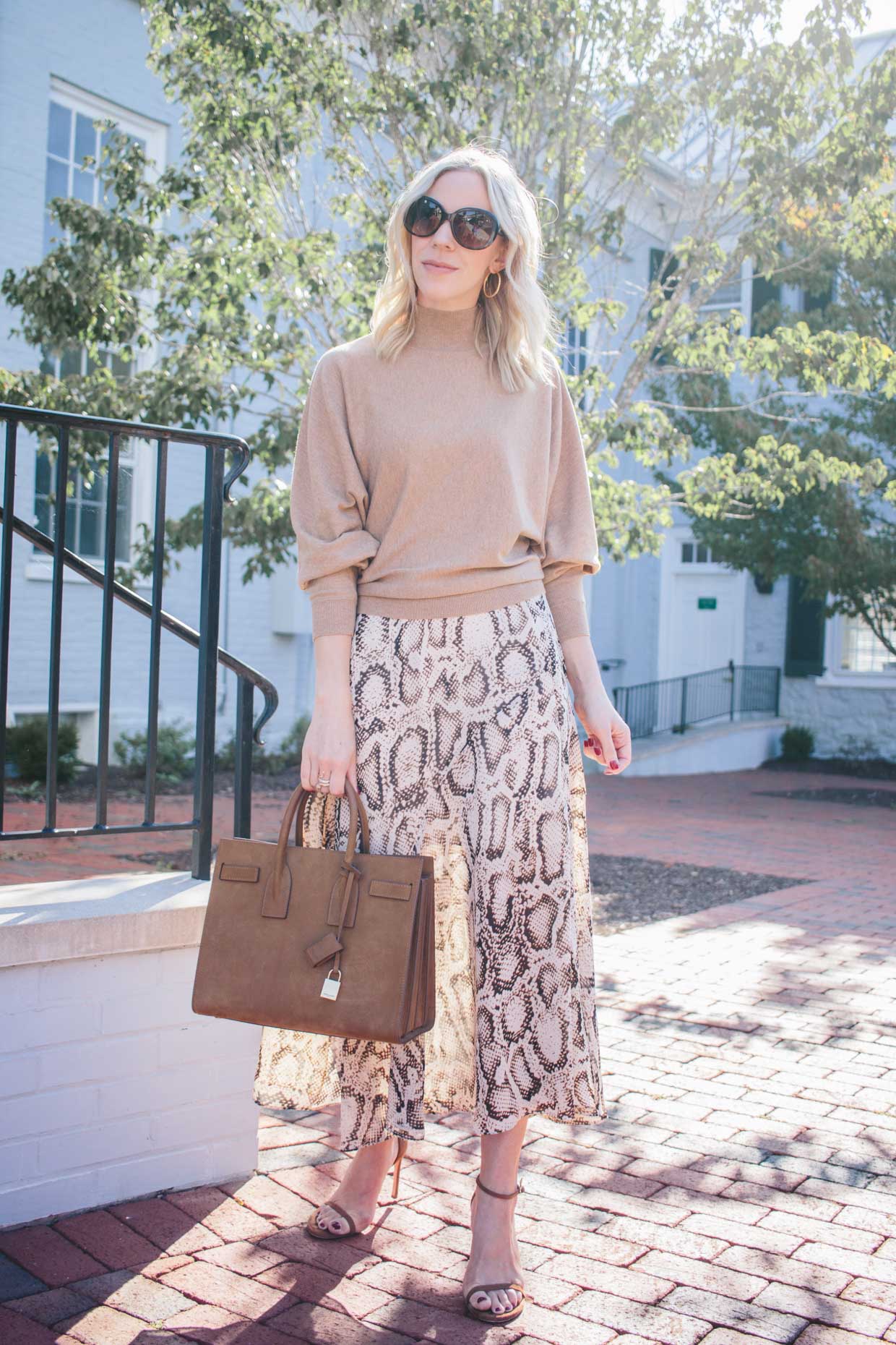 Meagan Brandon fashion blogger of Meagan's Moda styles a snakeskin print  midi skirt for fall with suede sandals and suede Saint Laurent sac de jour  - Meagan's Moda