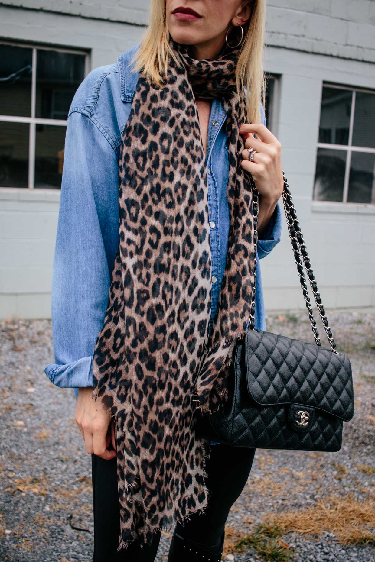 Meagan Brandon fashion blogger of Meagan s Moda styles H M leopard print scarf with denim shirt and Chanel Jumbo caviar black and silver bag Meagan s Moda