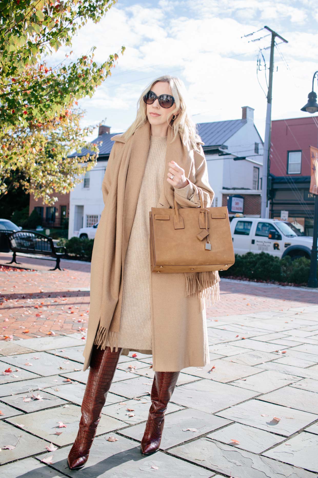 Meagan Brandon fashion blogger of Meagan's Moda wears camel poncho with  faux leather mini skirt, croc leather knee high boots and Louis Vuitton  Dauphine MM - Meagan's Moda