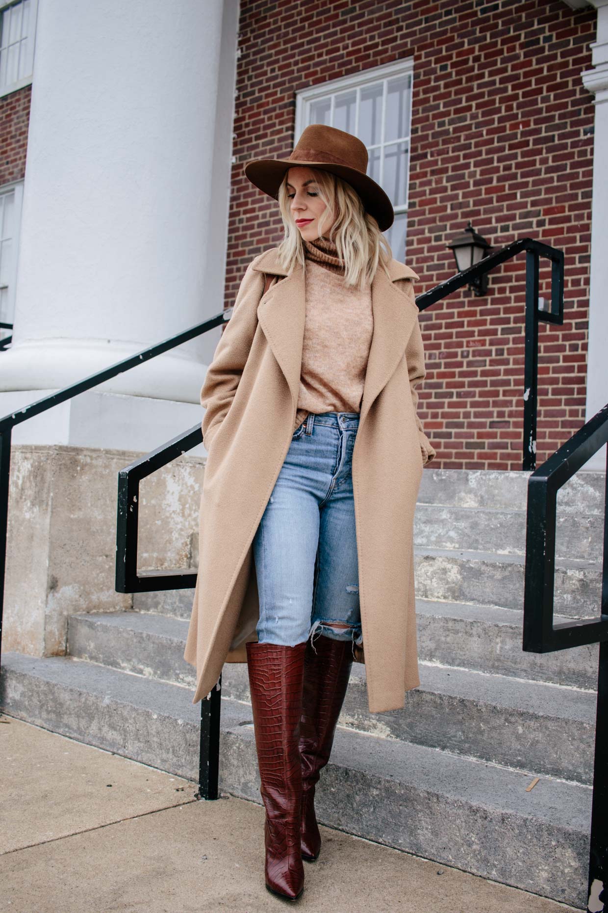 Meagan Brandon fashion blogger of Meagan's Moda wears camel poncho