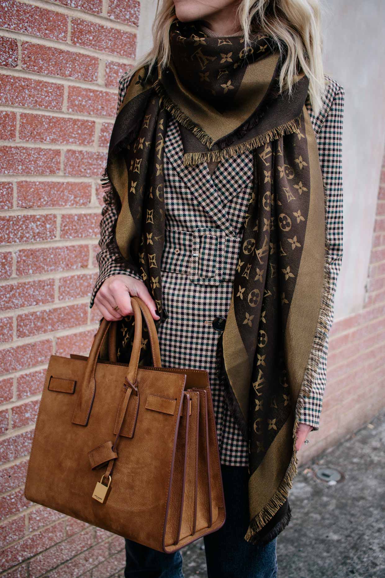 Meagan Brandon fashion blogger of Meagan's Moda wears Louis Vuitton brown shine  shawl monogram scarf with H&M belted plaid blazer and Saint Laurent suede  sac de jour - Meagan's Moda