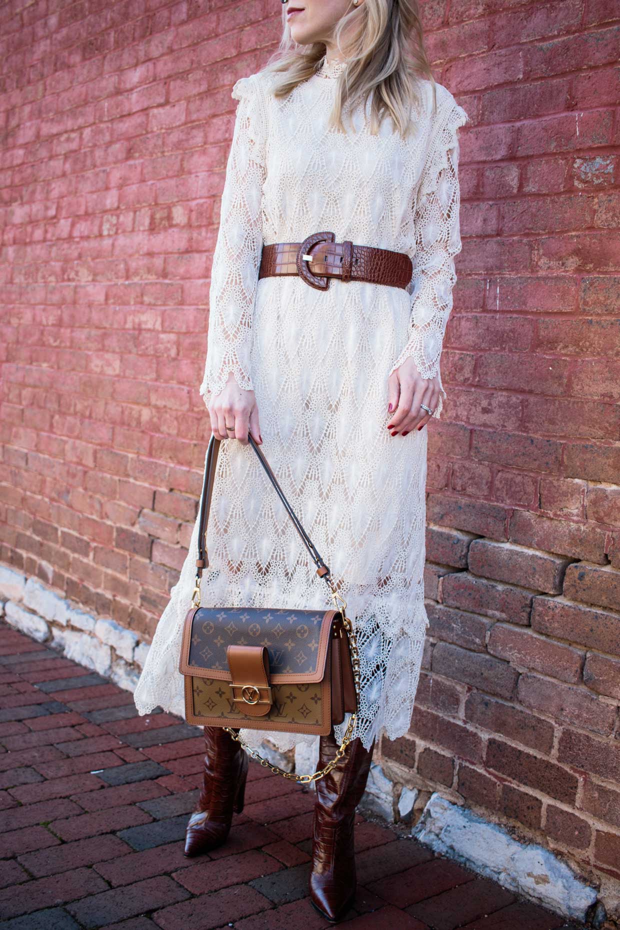 Meagan Brandon fashion blogger of Meagan's Moda wears lace midi dress with  Mango wide croc leather belt and Louis Vuitton Dauphine MM bag - Meagan's  Moda