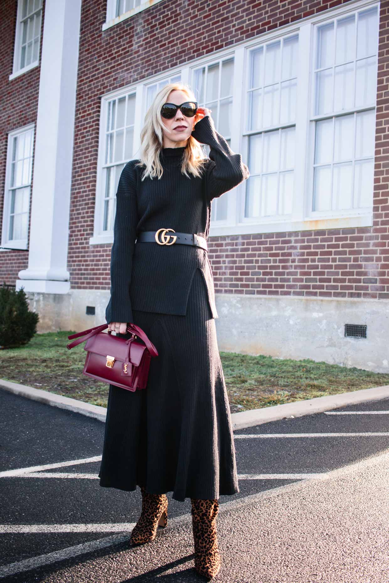 Meagan Brandon fashion blogger of Meagan's Moda styles a snakeskin print  midi skirt for fall with suede sandals and suede Saint Laurent sac de jour  - Meagan's Moda