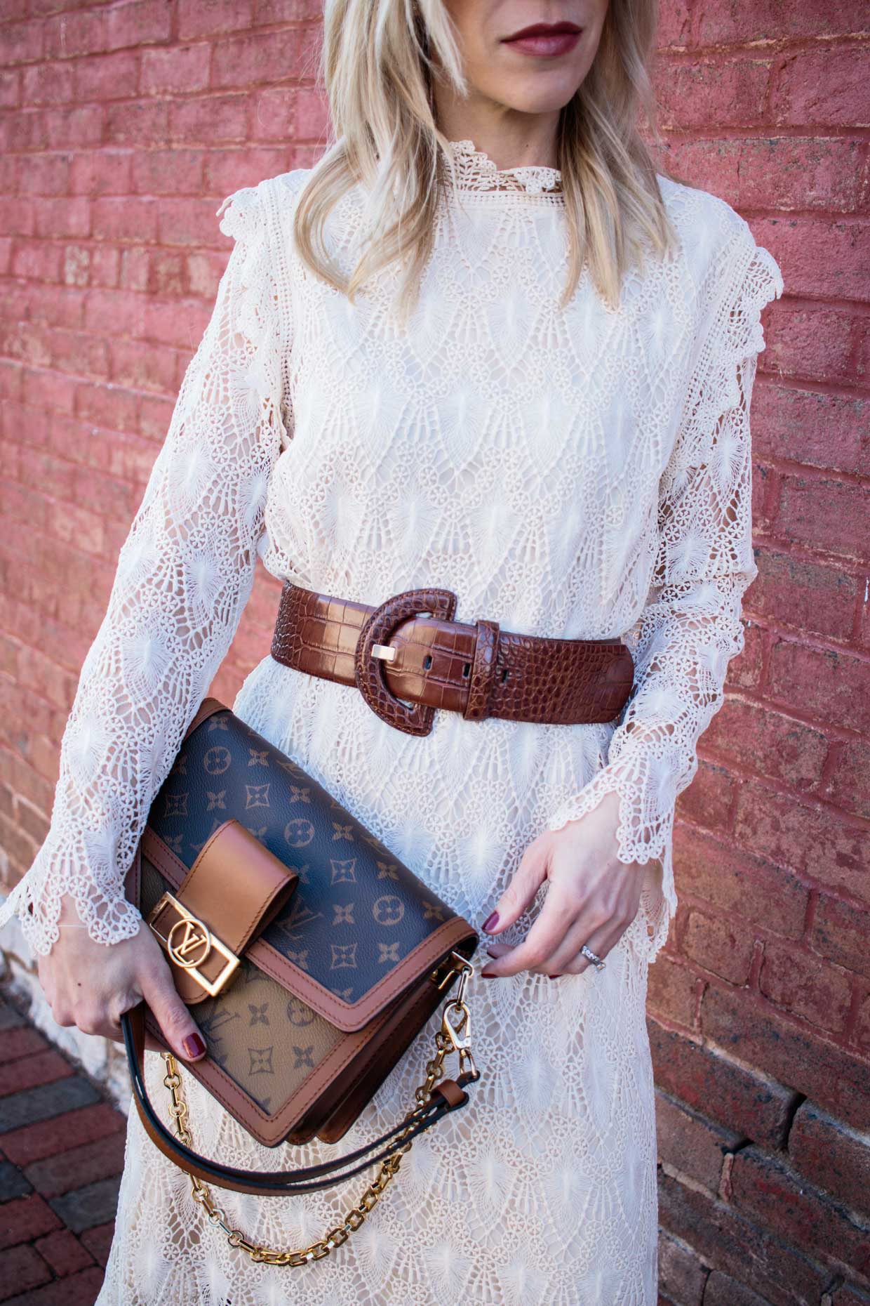 Meagan Brandon fashion blogger of Meagan's Moda wears lace midi dress with  Mango wide croc leather belt and Louis Vuitton Dauphine MM bag - Meagan's  Moda