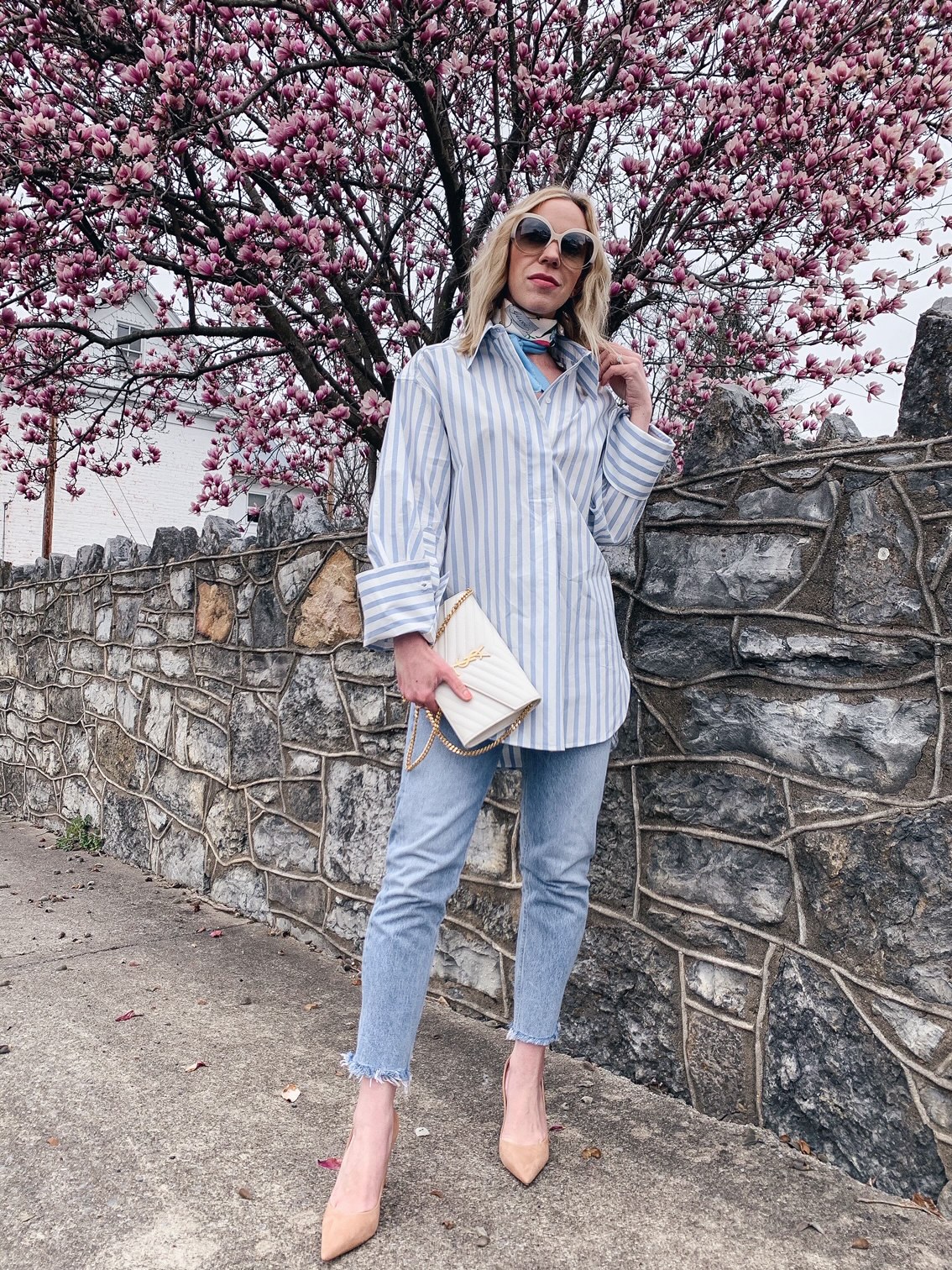 Meagan Brandon fashion blogger of Meagan's Moda wears blue and white  striped shirt with olive paperbag waist shorts and Gucci bag - Meagan's Moda