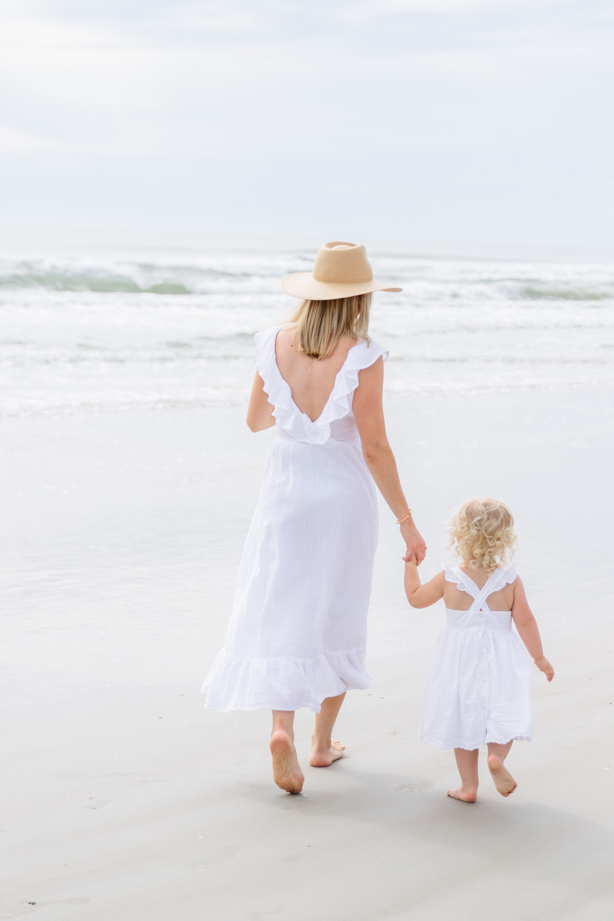 Mommy and Me white ruffled dresses for the beach, Mommy and me matching outfit idea for beach photos