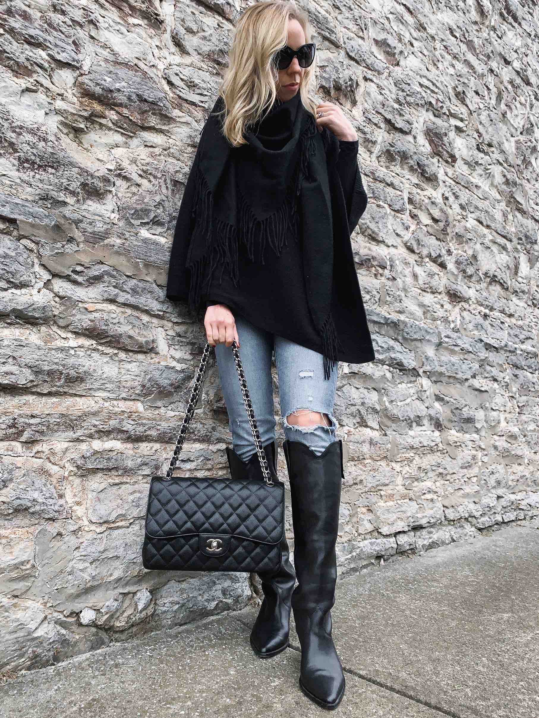 poll Tijdens ~ partij Meagan Brandon fashion blogger of Meagan's Moda wears black poncho with  distressed jeans and Isabel Marant Denvee western boots, modern ways to  wear a poncho - Meagan's Moda