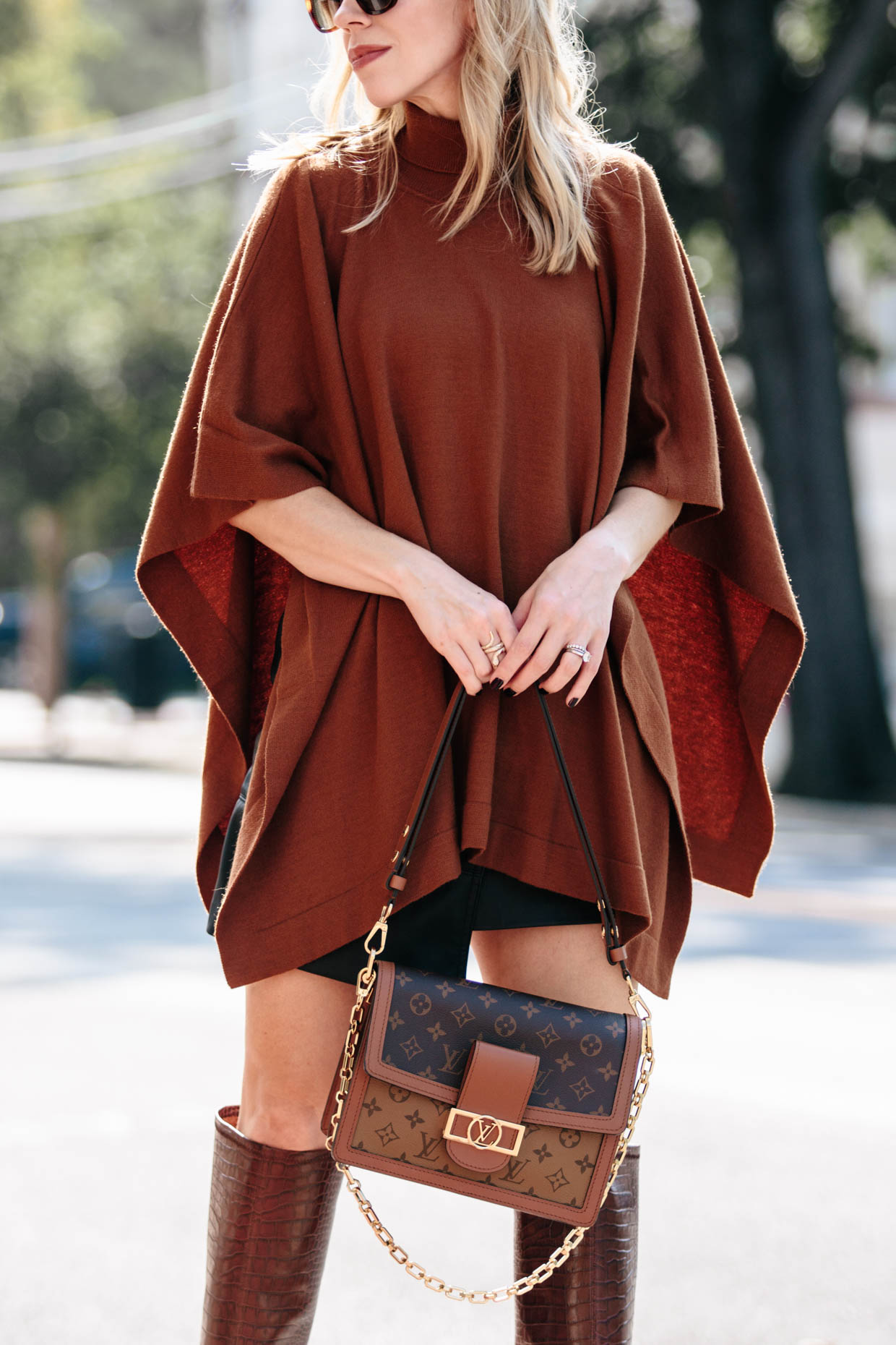 Meagan Brandon fashion blogger of Meagan's Moda wears camel poncho with Louis  Vuitton Dauphine MM - Meagan's Moda