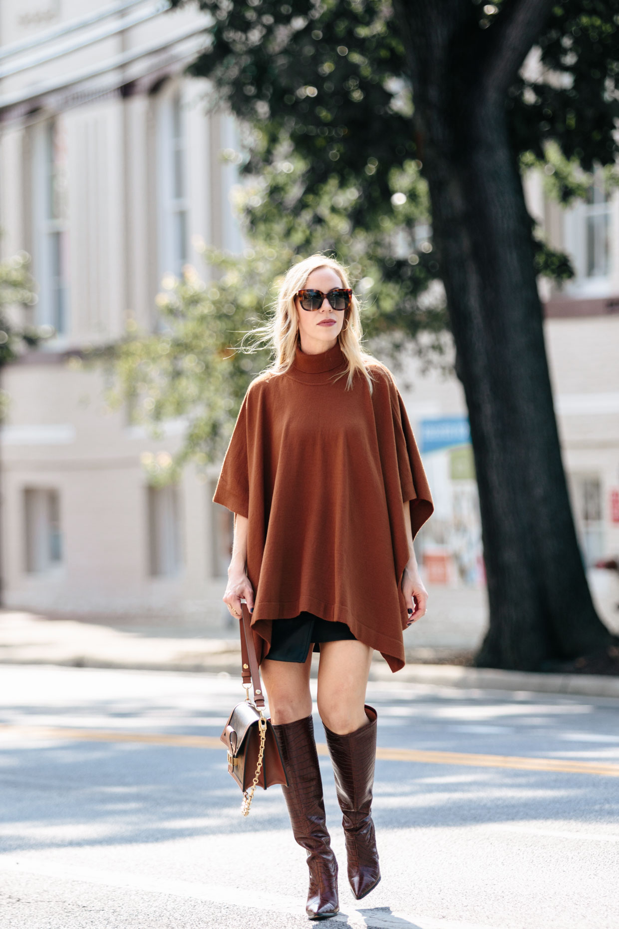 Meagan Brandon fashion blogger of Meagan's Moda wears rust colored