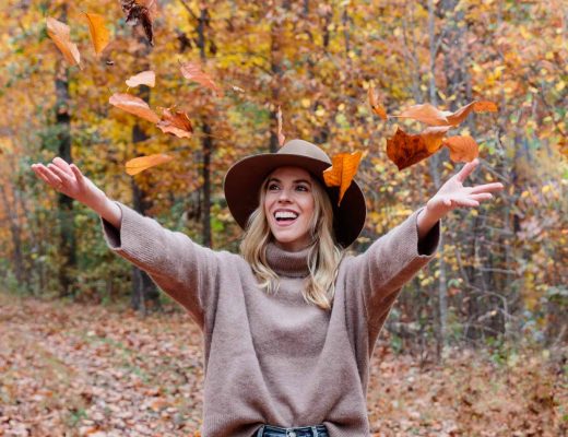 Meagan Brandon fashion blogger of Meagan's Moda fall leaf photo shoot with fall outfit