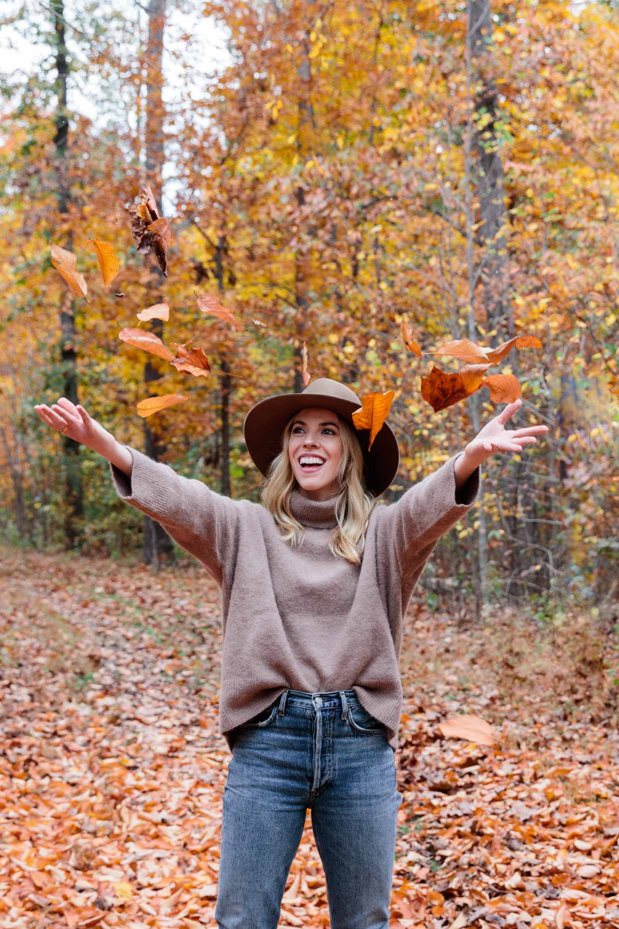 Meagan Brandon fashion blogger of Meagan's Moda fall leaf photo shoot with fall outfit