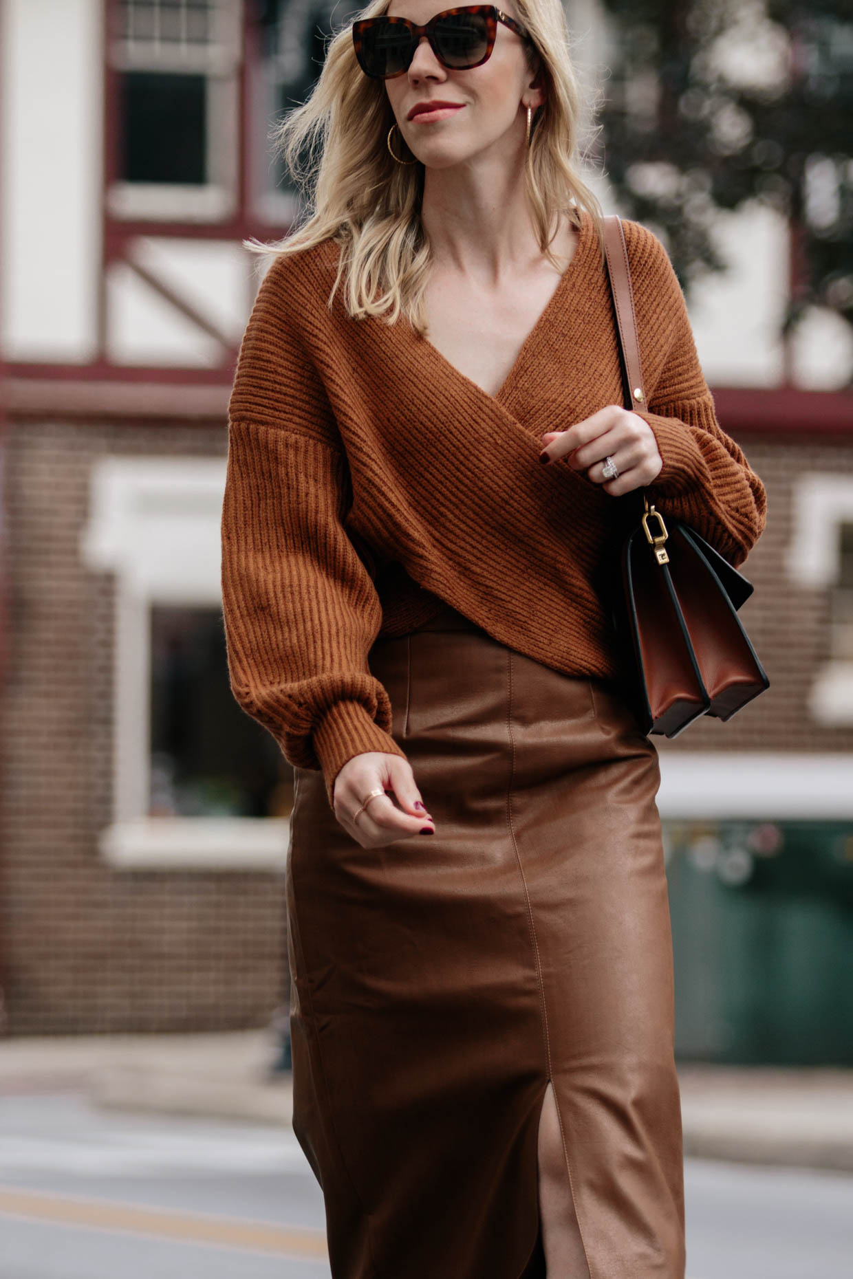 Meagan Brandon fashion blogger of Meagan's Moda styles a snakeskin print  midi skirt for fall with suede sandals and suede Saint Laurent sac de jour  - Meagan's Moda