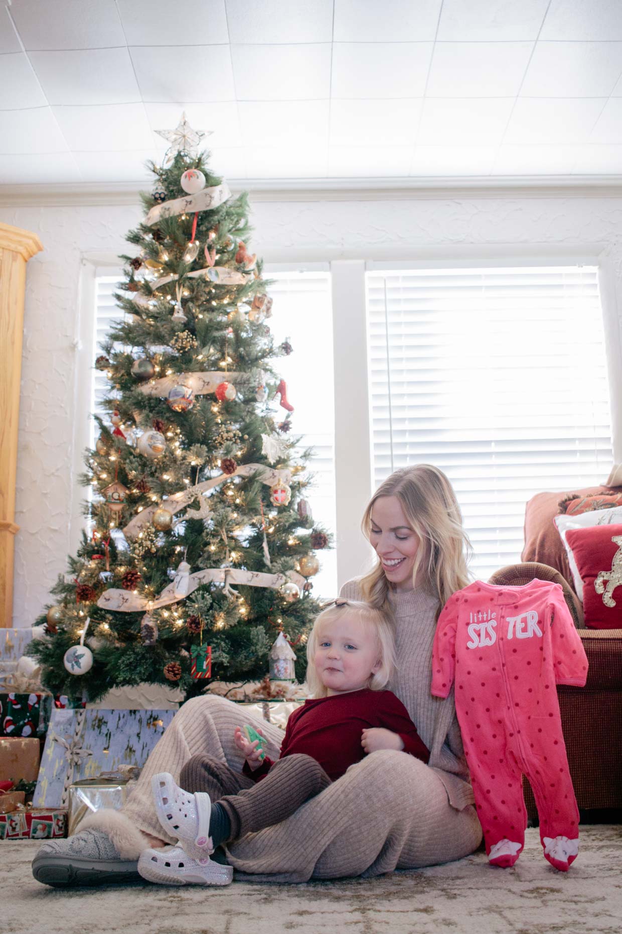 Meagan Brandon fashion blogger of Meagan's Moda gender reveal Christmas photo ideas