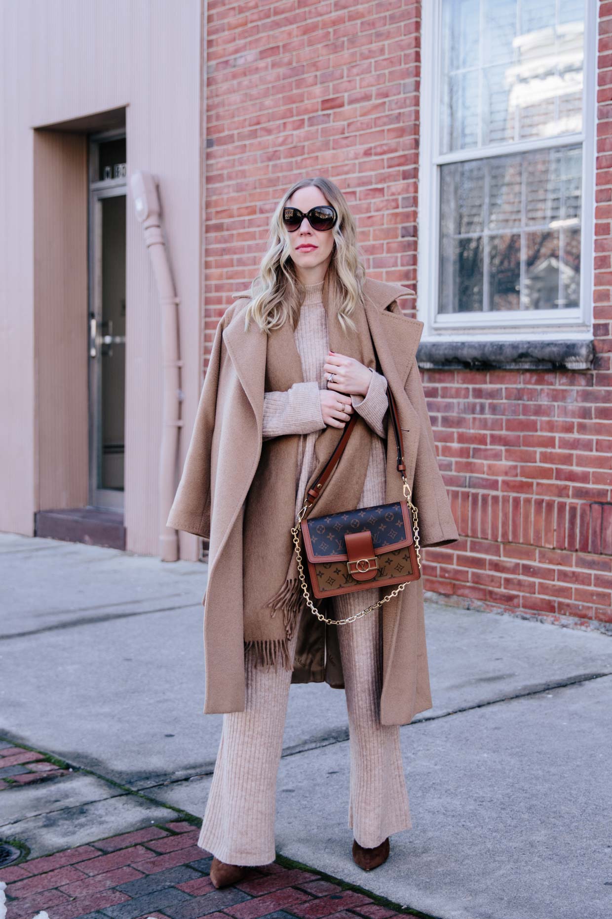 Meagan Brandon fashion blogger of Meagan's Moda wears camel poncho with  faux leather mini skirt, croc leather knee high boots and Louis Vuitton  Dauphine MM - Meagan's Moda