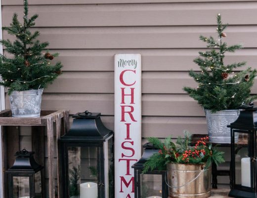 Meagan Brandon fashion lifestyle blogger of Meagan's Moda shares farmhouse Christmas porch decorations