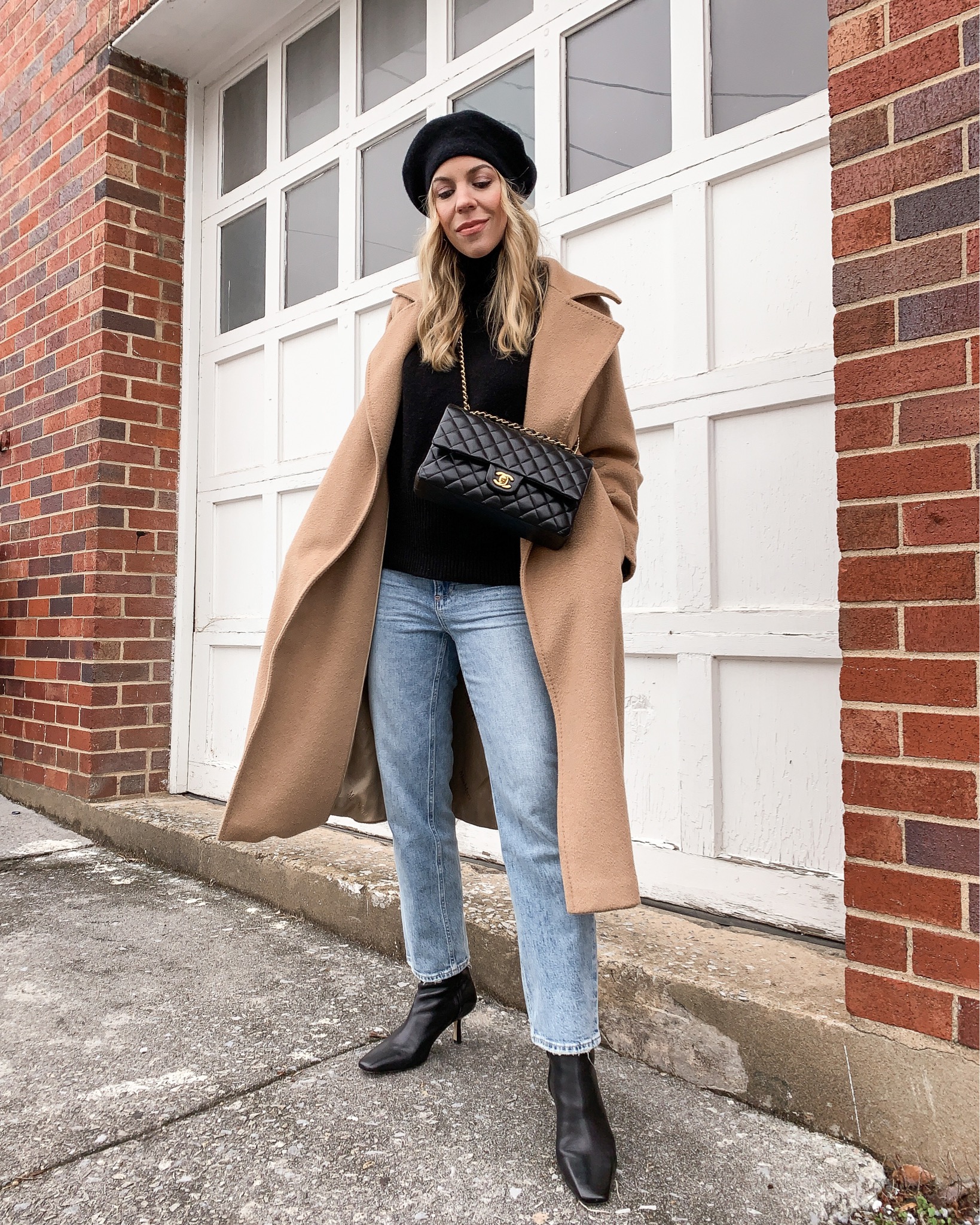 Meagan Brandon fashion blogger of Meagan's Moda wears Louis Vuitton black shine  shawl with black leather jacket and gray jeans, how to style a Louis Vuitton  shawl scarf - Meagan's Moda