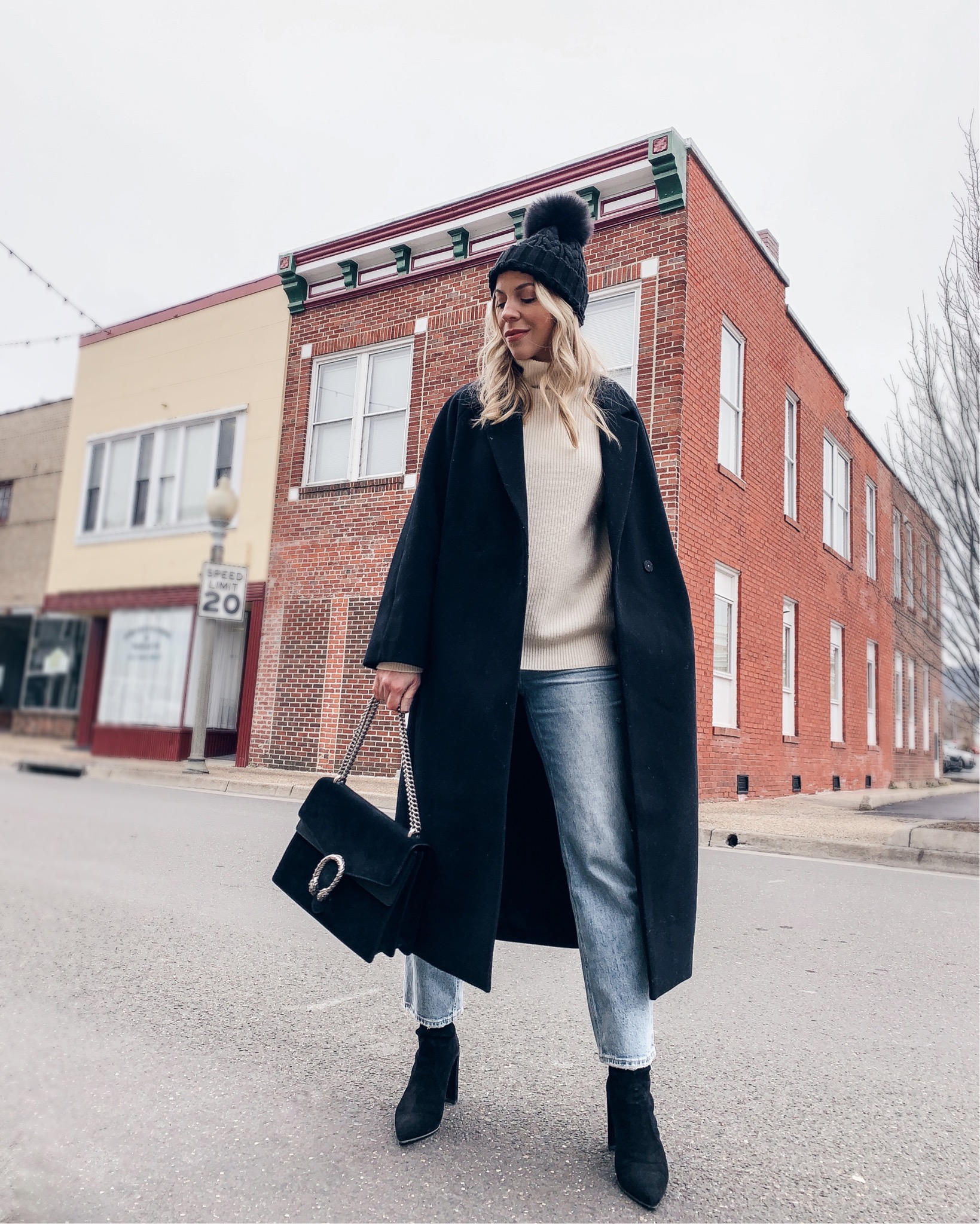 Meagan Brandon fashion blogger of Meagan's Moda wears Louis Vuitton black  shine shawl with black leather jacket and gray jeans, how to style a Louis  Vuitton shawl scarf - Meagan's Moda