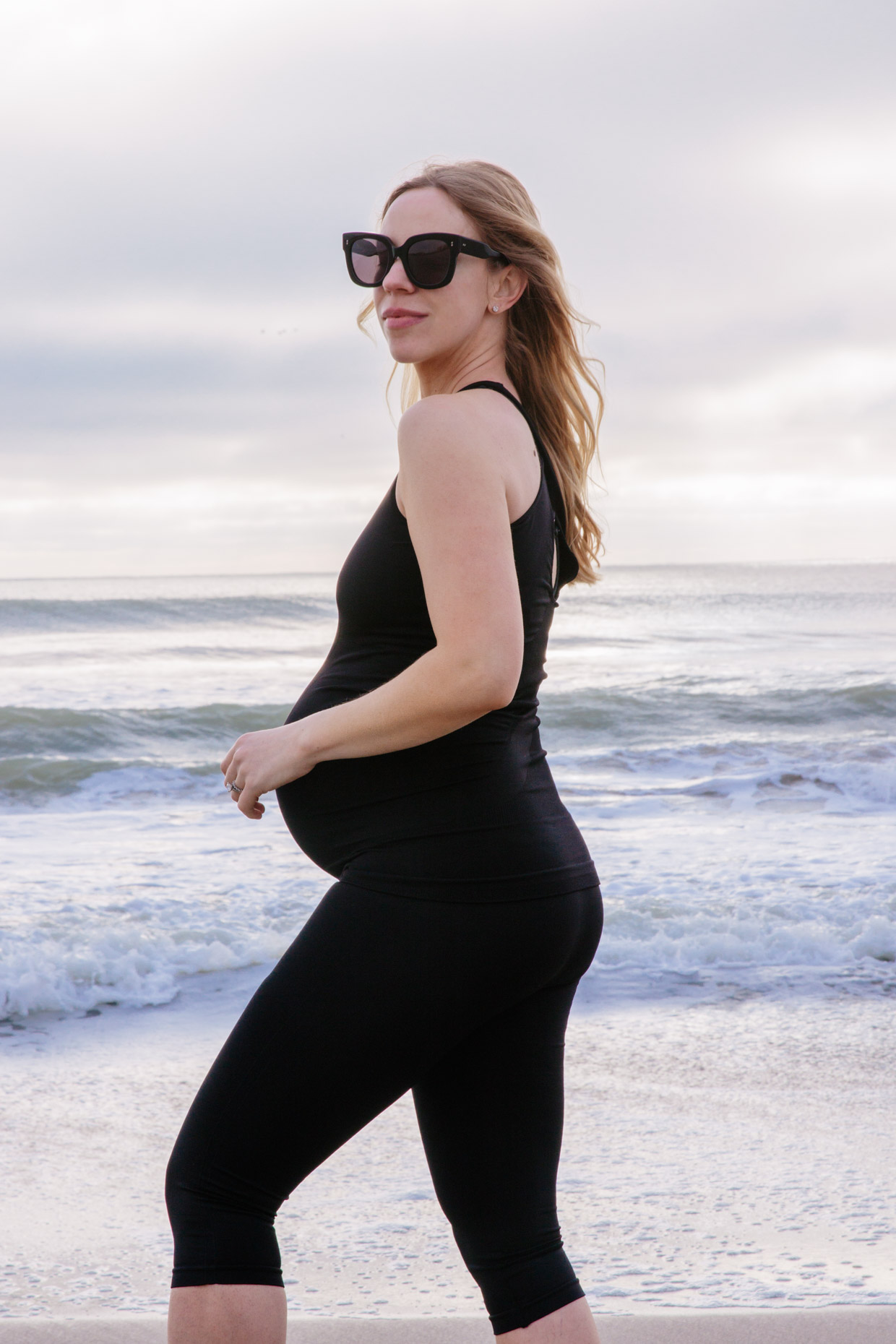 Meagan Brandon fashion blogger of Meagan's Moda styles BLANQI maternity  cropped leggings, best most flattering maternity leggings and activewear -  Meagan's Moda