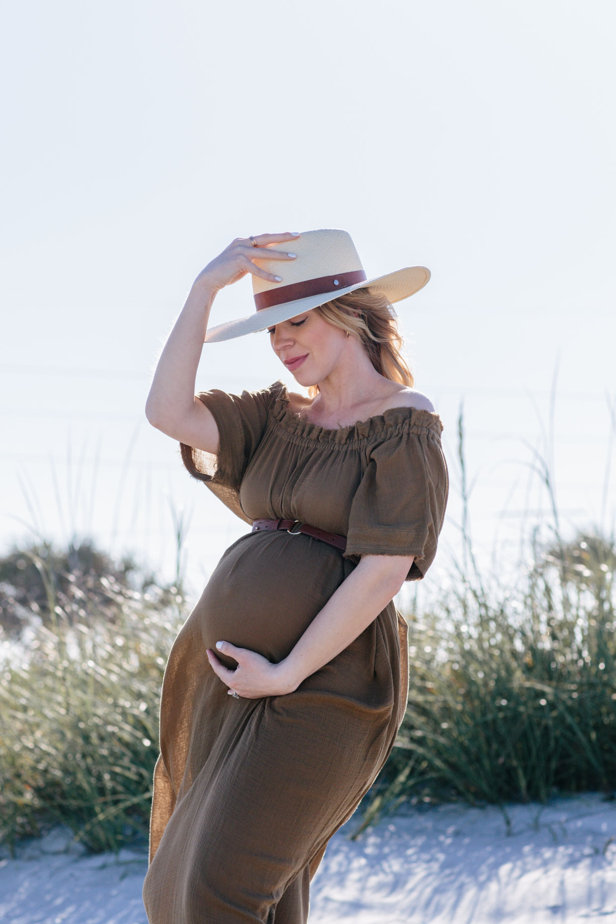 Meagan Brandon fashion blogger of Meagan's Moda wears off the shoulder beach caftan dress, third trimester maternity beach photo shoot