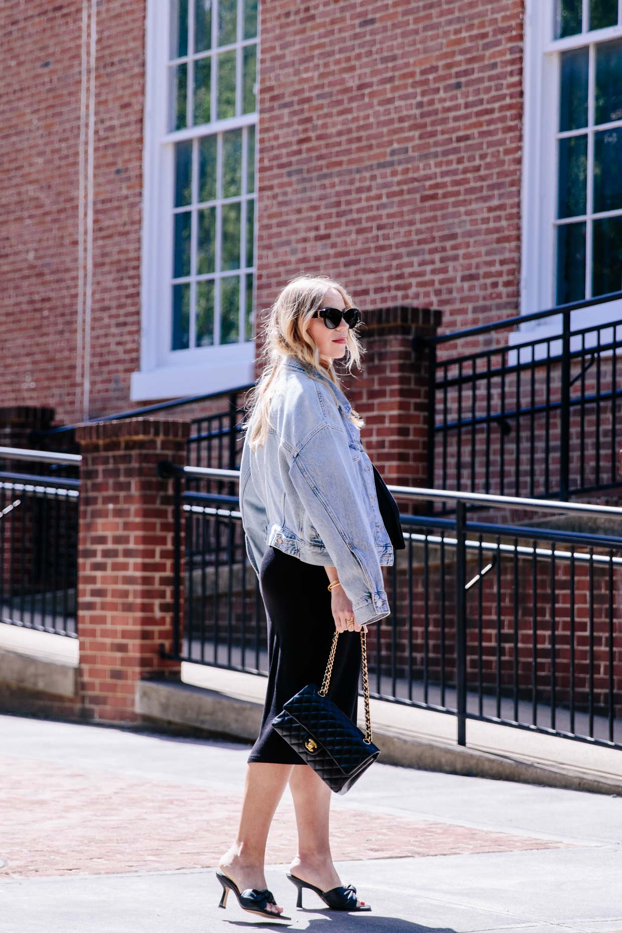 Meagan Brandon style influencer of Meagan's Moda wears cropped denim jacket  with Chanel brooch, ideas for wearing Chanel pin - Meagan's Moda