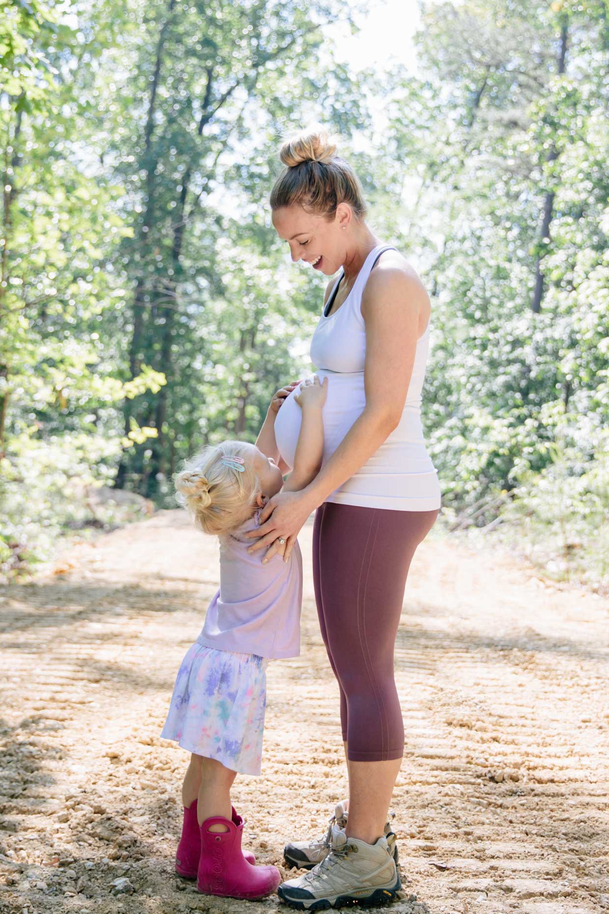 Meagan Brandon of Meagan's Moda wears BLANQI support tank and cropped leggings, tips for staying active at 37 weeks pregnant