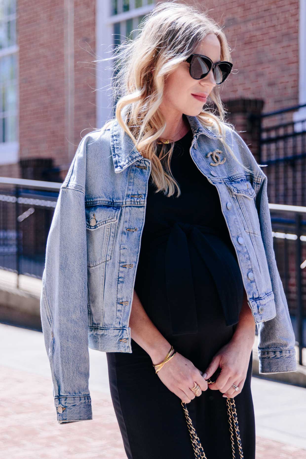 Meagan Brandon style influencer of Meagan's Moda wears cropped denim jacket  with Chanel brooch, ideas for wearing Chanel pin - Meagan's Moda